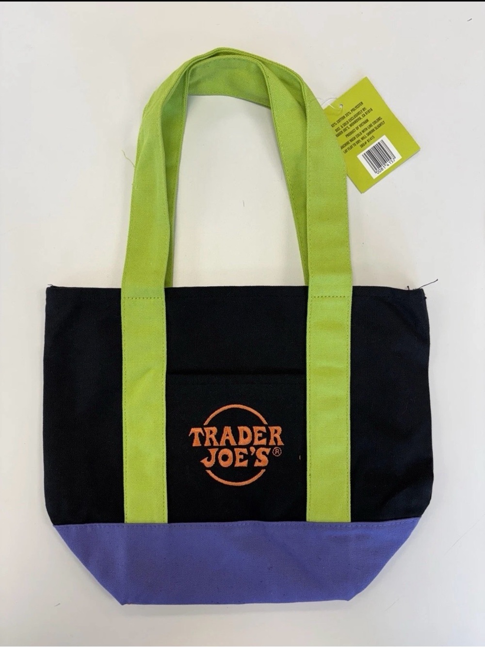 Trader Joe's Black Canvas Tote with Lime Green Handles and Purple Base